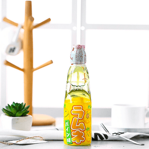 Ramune Soda Pineapple Flavor with fork and cup